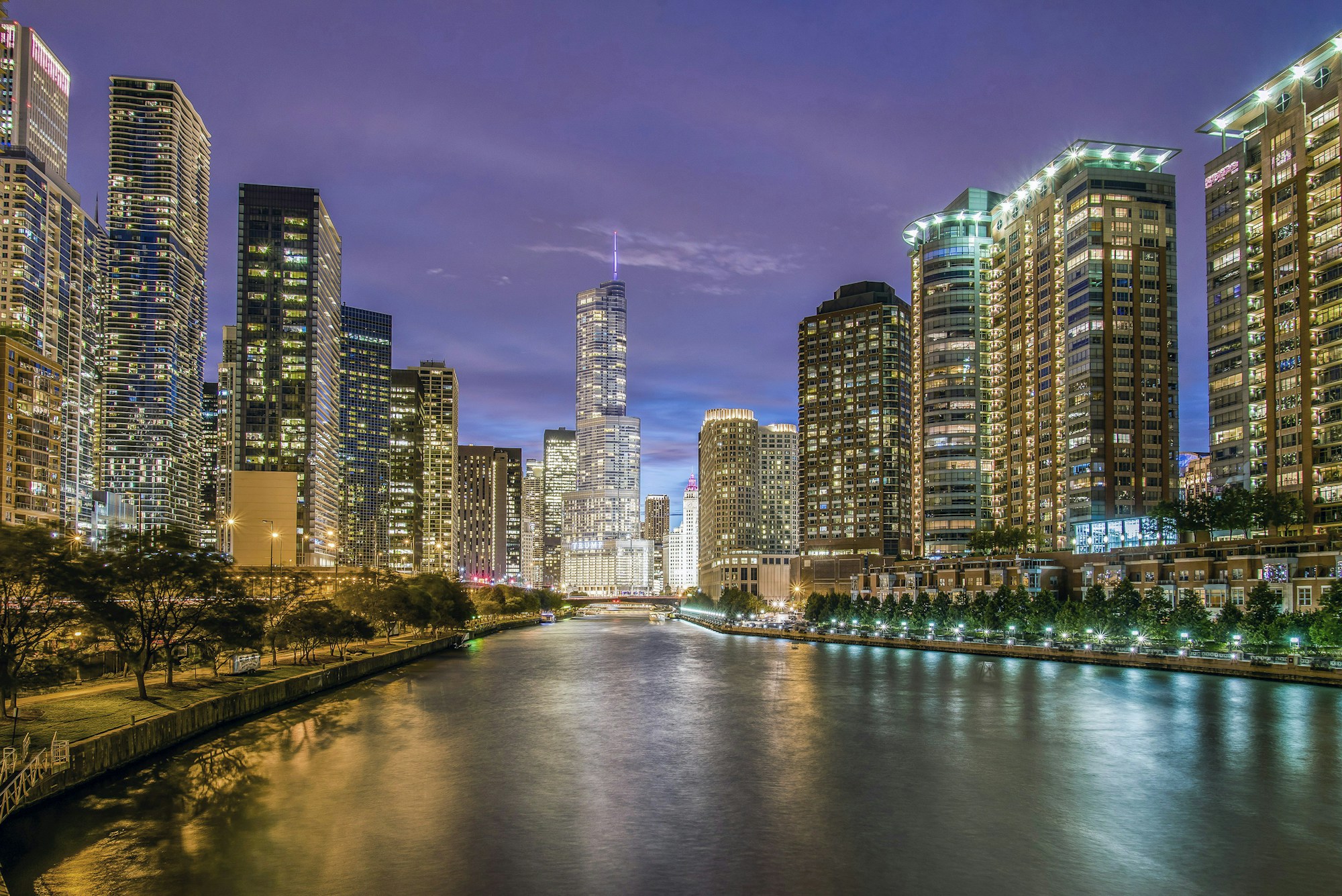 Chicago River and illuminated downtown buildings at dusk